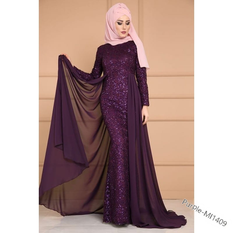 A noble elegant slim purple sequined evening gown featuring a deep purple long-sleeved design with a sequined bodice and a flowing sheer overlay.