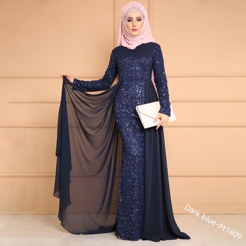 noble elegant slim purple sequined evening gown in dark blue with long sleeves floor-length design and sheer overlay featuring slimming sequined details.
