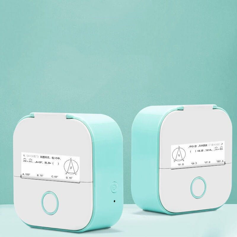 Two mint green and white portable mini label printers with rolls sticky paper displaying printed math problems in their output slots.