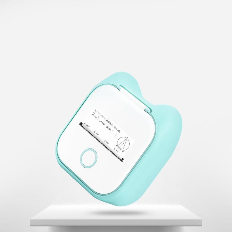 A mint green portable mini label printer with soft silicone cover and white display screen showing geometric diagrams designed for use with rolls sticky paper.