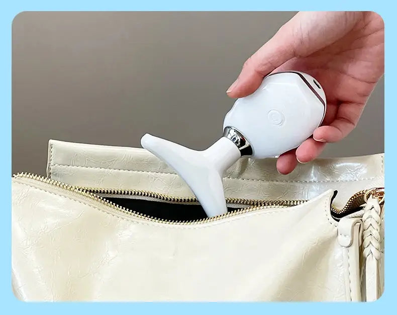 white handheld neck face beauty device with a sleek rounded head and slender stem designed as a face beauty device colorful led wrinkle remover.