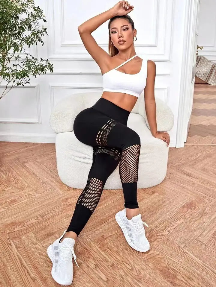 black hollow seamless yoga pants with mesh panels and a high-waisted design ideal for yoga pants training