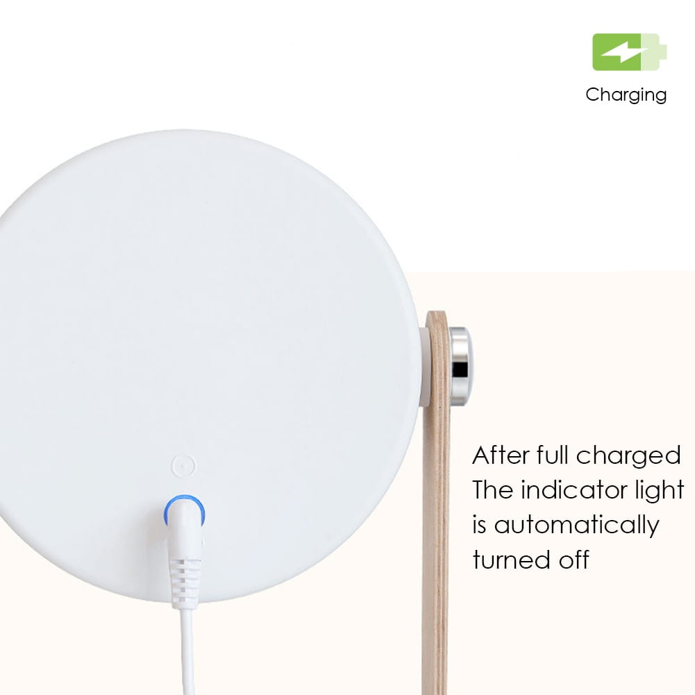 white circular wireless charging pad with wooden stand and silver metallic base featured with foldable touch dimmable design for night light and touch dimmable reading use