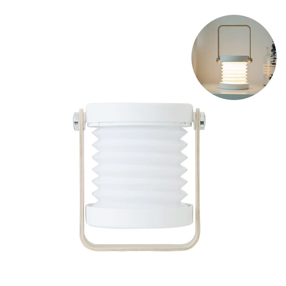 white foldable touch dimmable portable night light with a sleek metallic frame designed as a collapsible lantern for touch dimmable reading and ambient lighting.