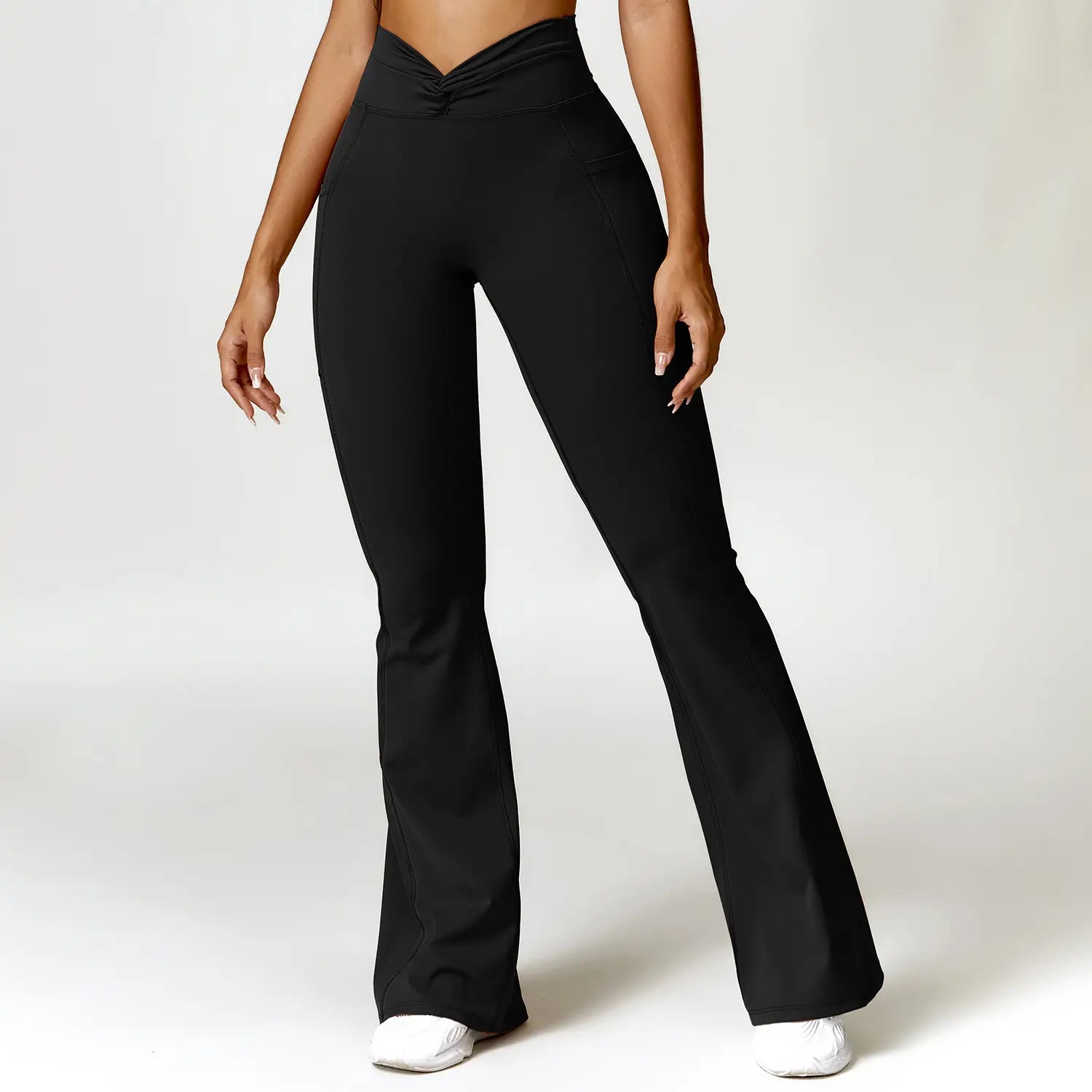 black high-waisted flared leggings with a flattering v-notch waistband designed for american hip raise and raise high waist support in activewear.