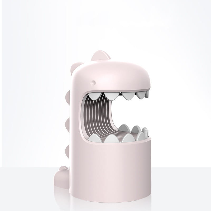 Pastel pink plastic george dinosaur mosquito lamp shaped like a dinosaur with white teeth and gray ridges along its back.