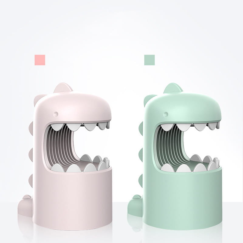pastel pink and mint green george dinosaur mosquito lamp desk organizers feature smooth plastic bodies with open mouths revealing stacked compartments for storage.