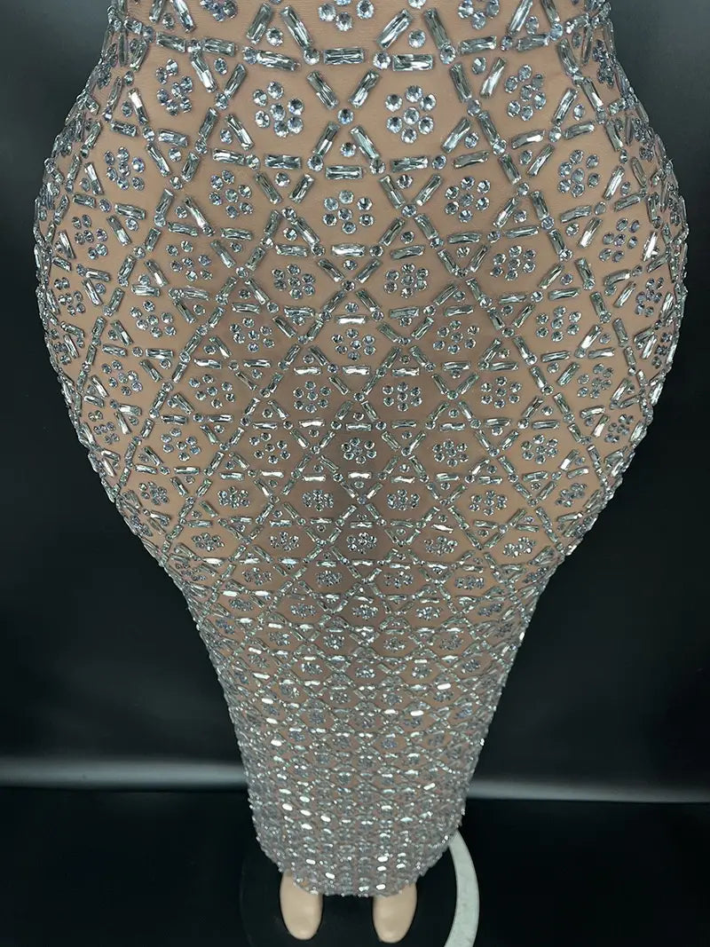 a silver metallic niche princess gathering banquet dress featuring a shimmering silver beaded bodycon design with a sheer mesh base and intricate geometric patterns