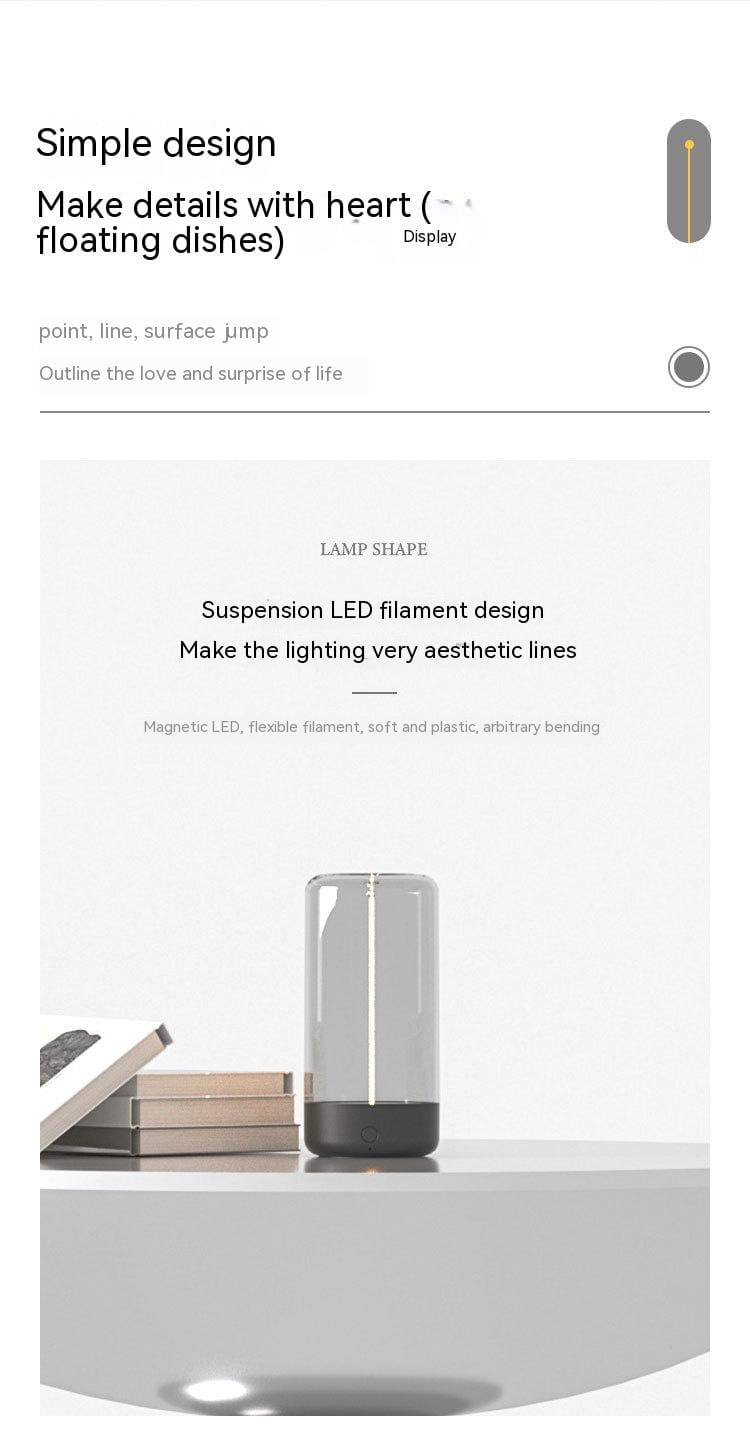 a sleek cylindrical rechargeable portable night light led camping light with a transparent glass body and black base