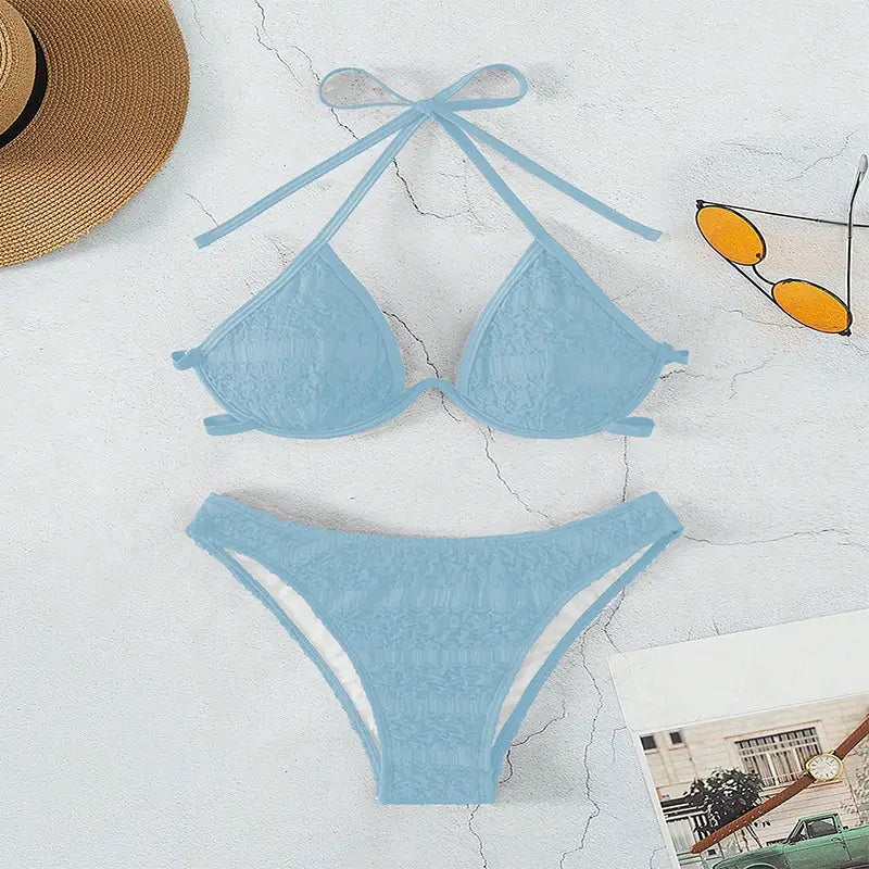 Light blue lace bikini split swimsuit with delicate floral patterns and thin tie-back straps.