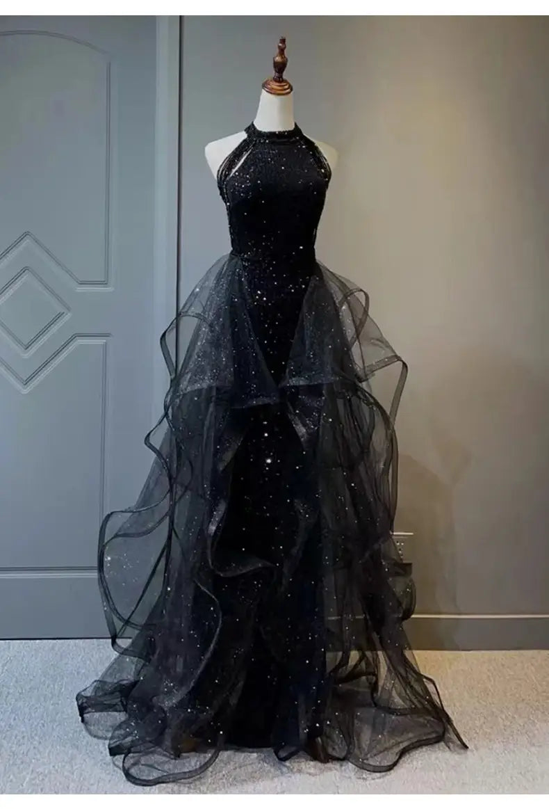 Black sequined halter black evening dress with layered tulle skirt for elegant evening occasions