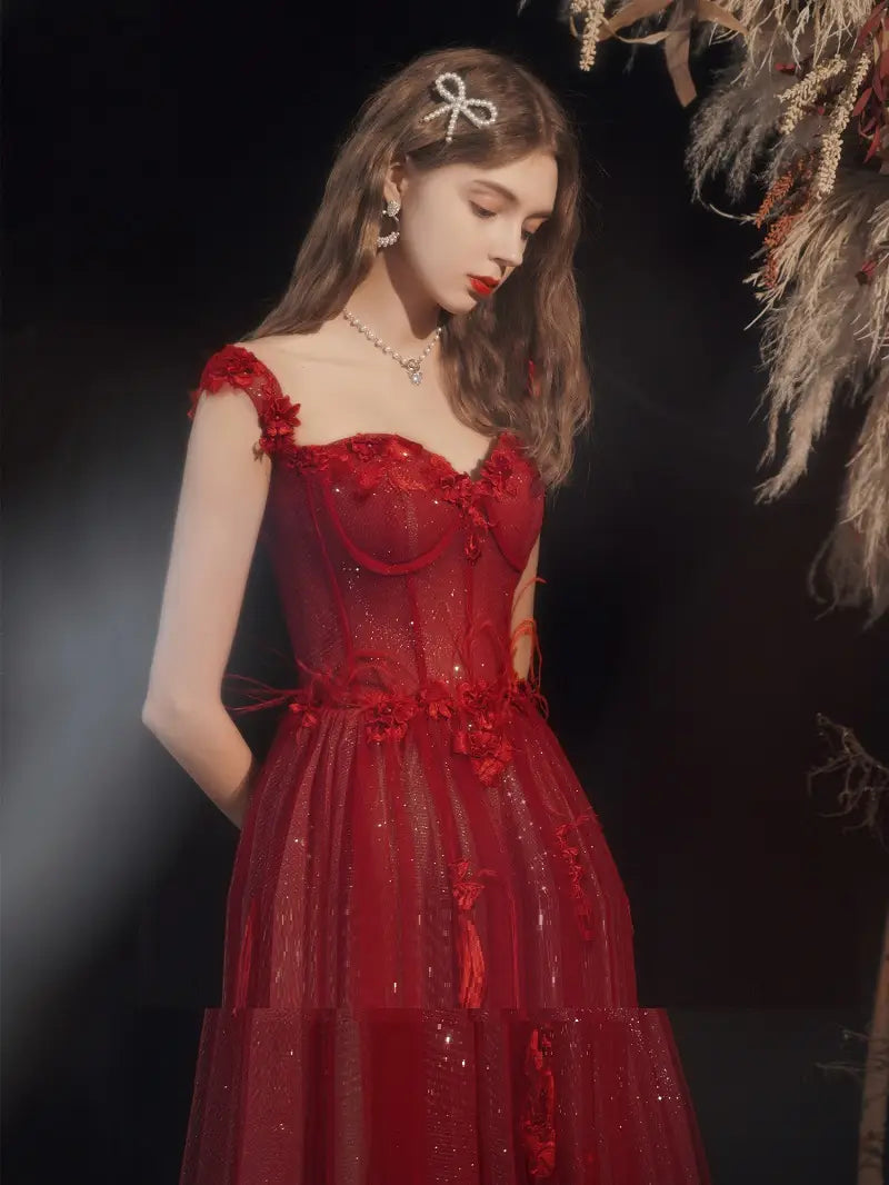 a shimmering red lace off shoulder wedding toast dress with floral appliqués and a sparkling sheer overlay designed for toast dress host or dress host annual events