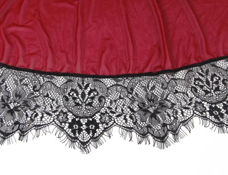 plus size sexy lingerie nightdress featuring black floral lace trim with frayed edges attached to rich red satin fabric.