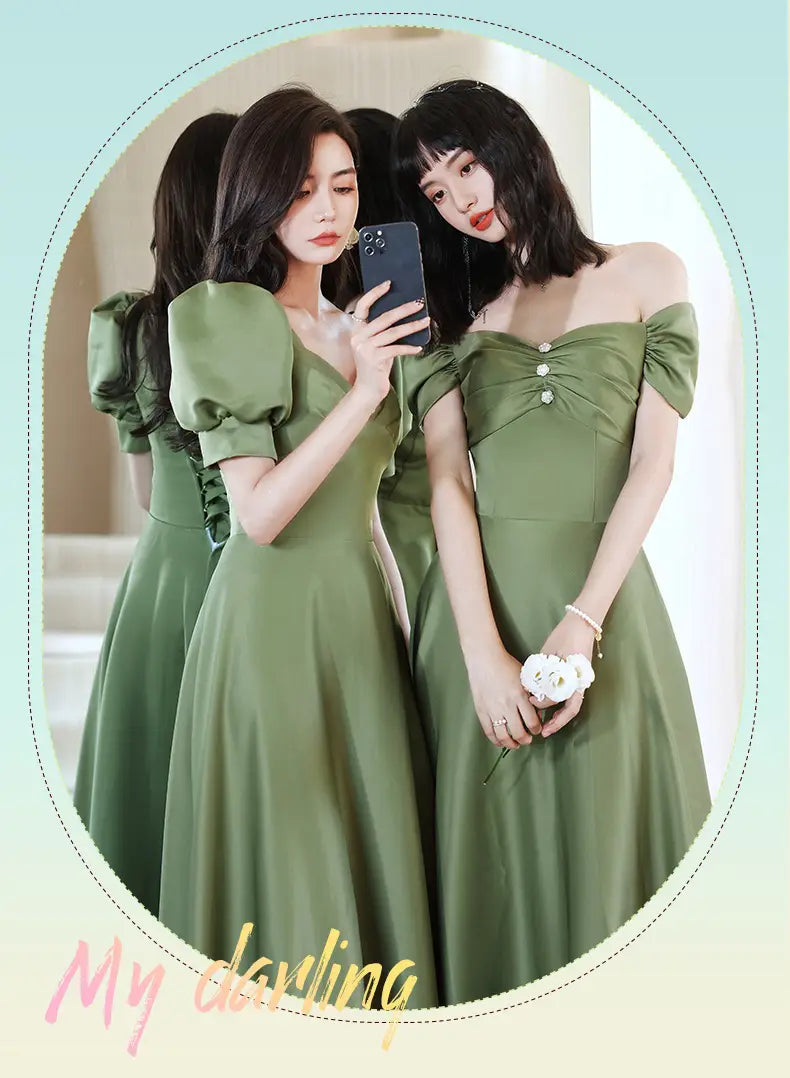 olive green satin off-the-shoulder midi dress with puffed sleeves and pearl button detail from the avocado green sisters group collection.