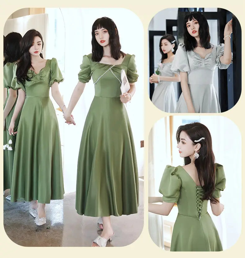 olive green satin midi dress with puffed sleeves and square neckline from the avocado green sisters group collection in a silver gray setting