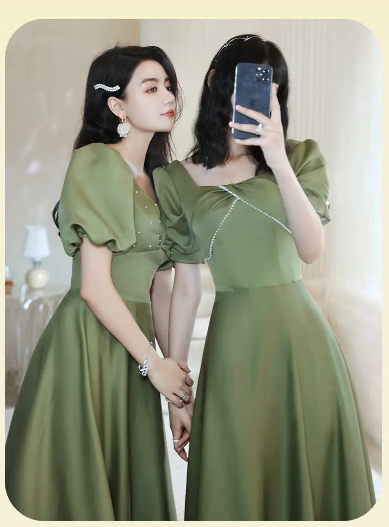 olive green satin avocado green sisters group midi dress with puffed sleeves and fitted bodice ideal for bridesmaids in green sisters group collections