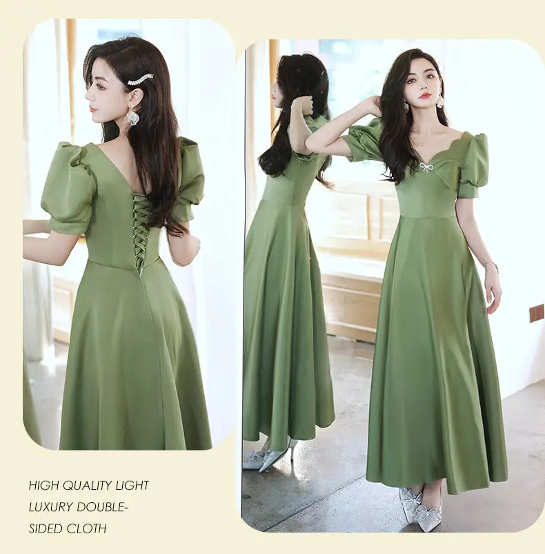An elegant avocado green sisters group satin midi dress featuring puffed short sleeves v-neckline and lace-up back.