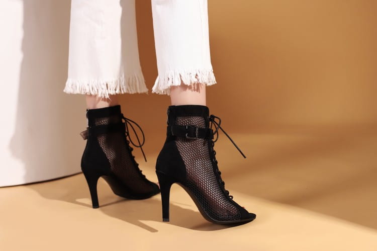 black mesh ankle boots with stylish peep toe hollow lace-up detailing and high stiletto heel designed as dance heels