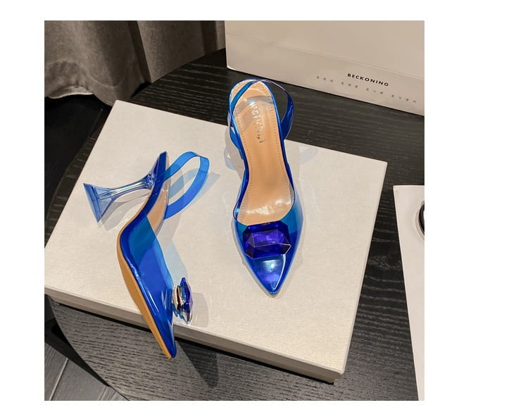 pink satin bow women’s high-heeled sandal featuring vibrant blue transparent high-heeled sandal with a sleek glossy finish and a decorative metallic accent on the toe