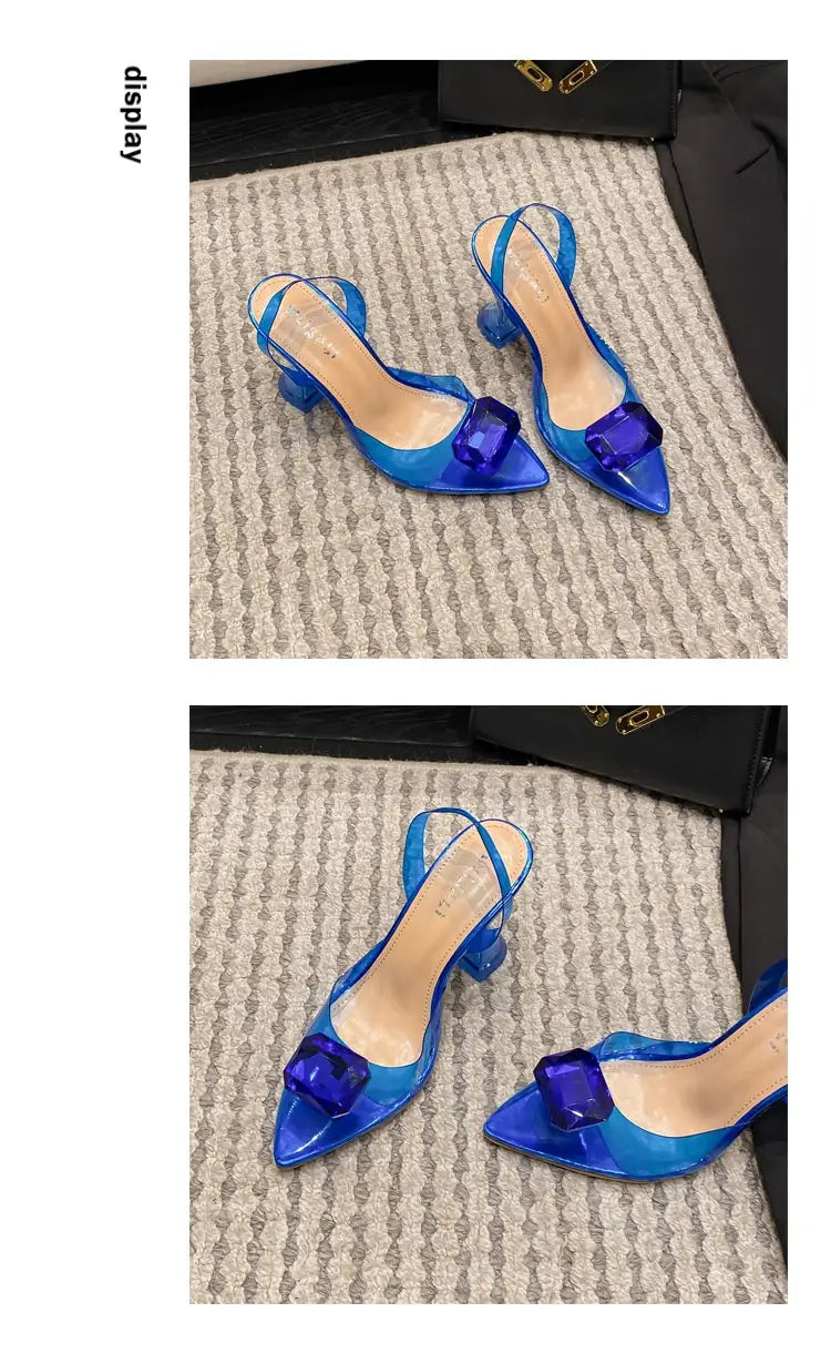 Pink satin bow women’s high-heeled sandal featuring transparent blue acrylic heels with a bold purple gemstone accent at the toe.