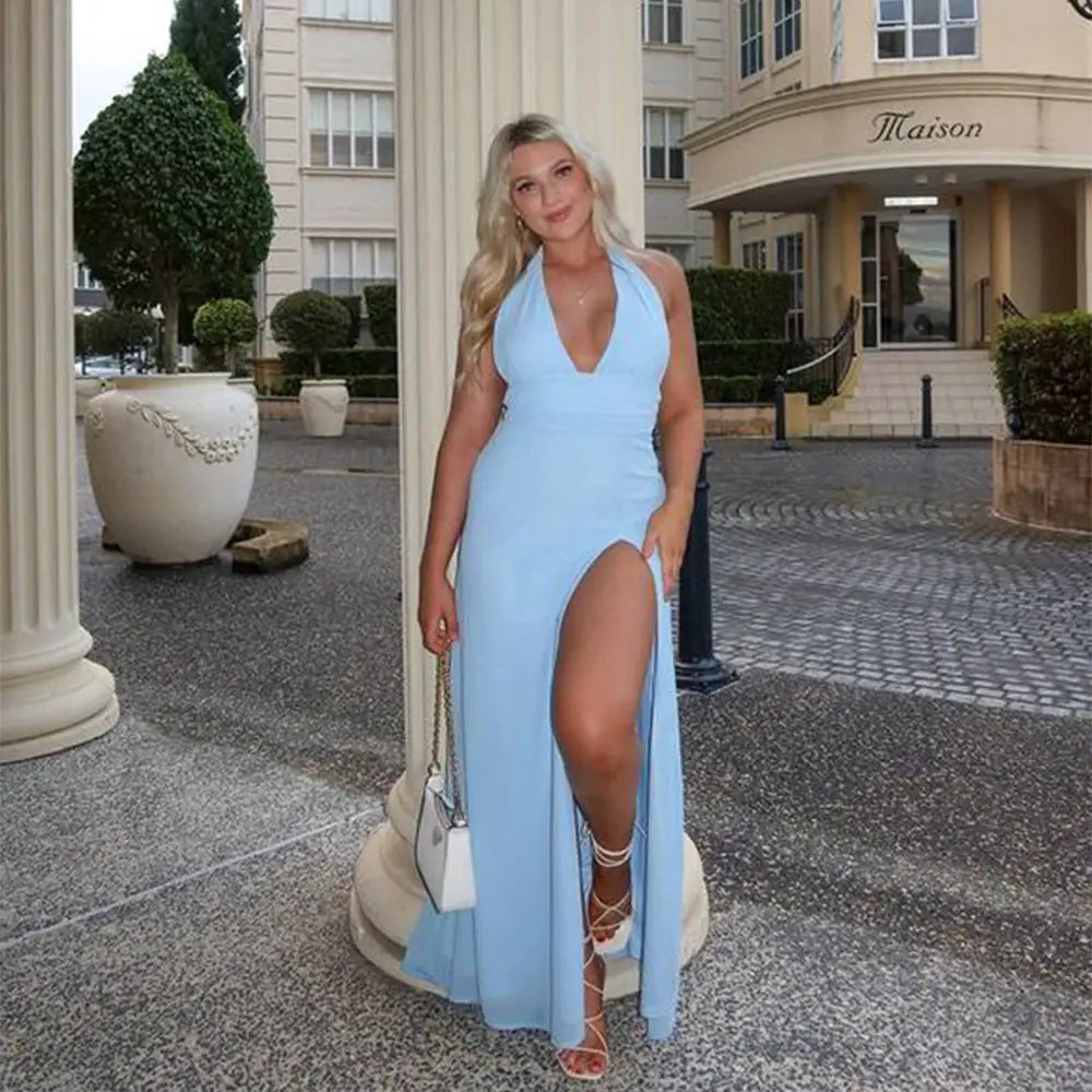 a light blue halter-neck maxi slit dress summer backless strappy style with flowing fabric perfect for summer occasions