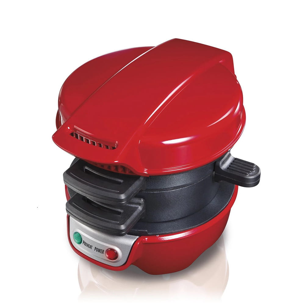 Red Hamilton Beach electric hamburger maker and egg toaster in red with black accents featuring a sleek rounded design suitable for versatile kitchen use.