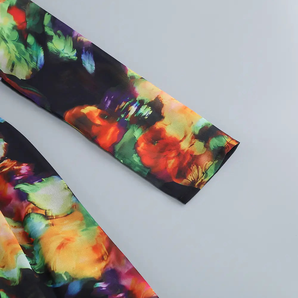 floral v-neck split comfort casual dress featuring vibrant floral-patterned long sleeves with bold red green and orange blooms on dark background fabric