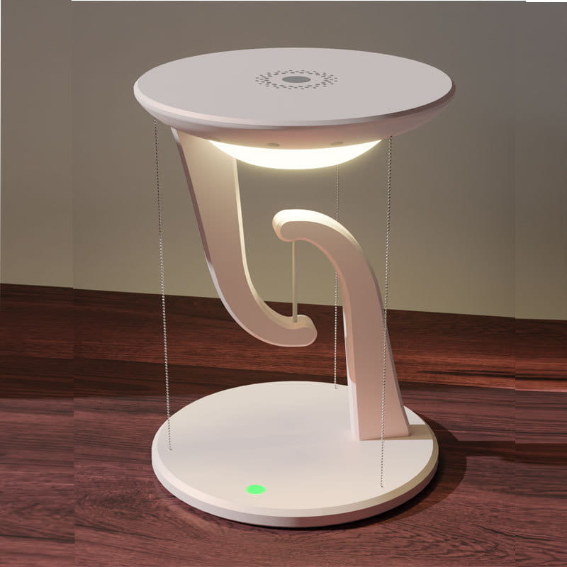 White modern desk lamp with a sleek curved base and circular top emitting warm light featuring a creative smart wireless phone charger suspension lamp design.