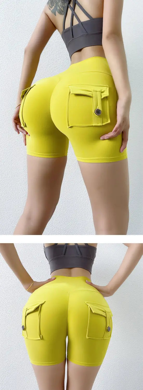 bright yellow high-waisted athletic shorts with cargo pockets and button closures offering a celebrity nude feel pocket design ideal for activewear.