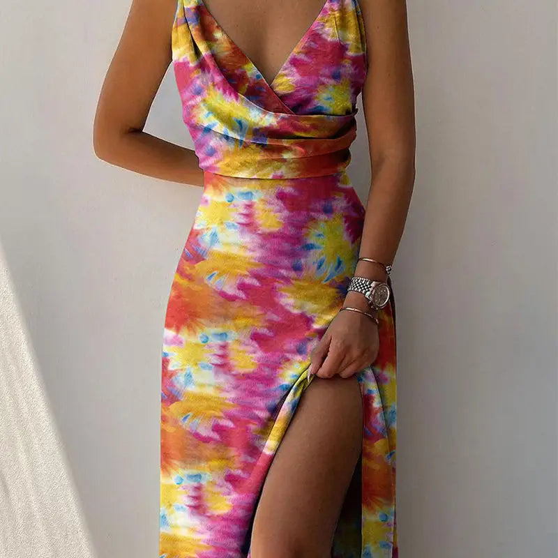 A vibrant tie-dye satin slit sling dress in sage green with a plunging v-neckline and high slit ideal for sling dress summer and dress summer fashion.