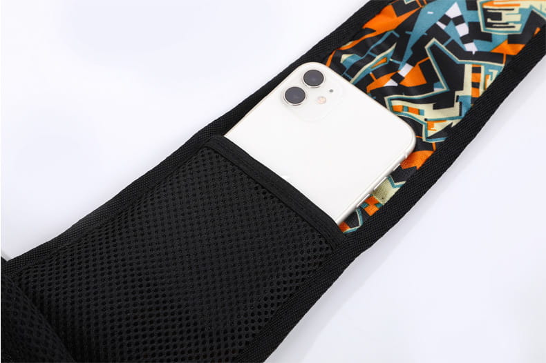 black mesh carrying pets bag for women featuring a vibrant orange teal and black geometric patterned inner lining, designed for outdoor use.