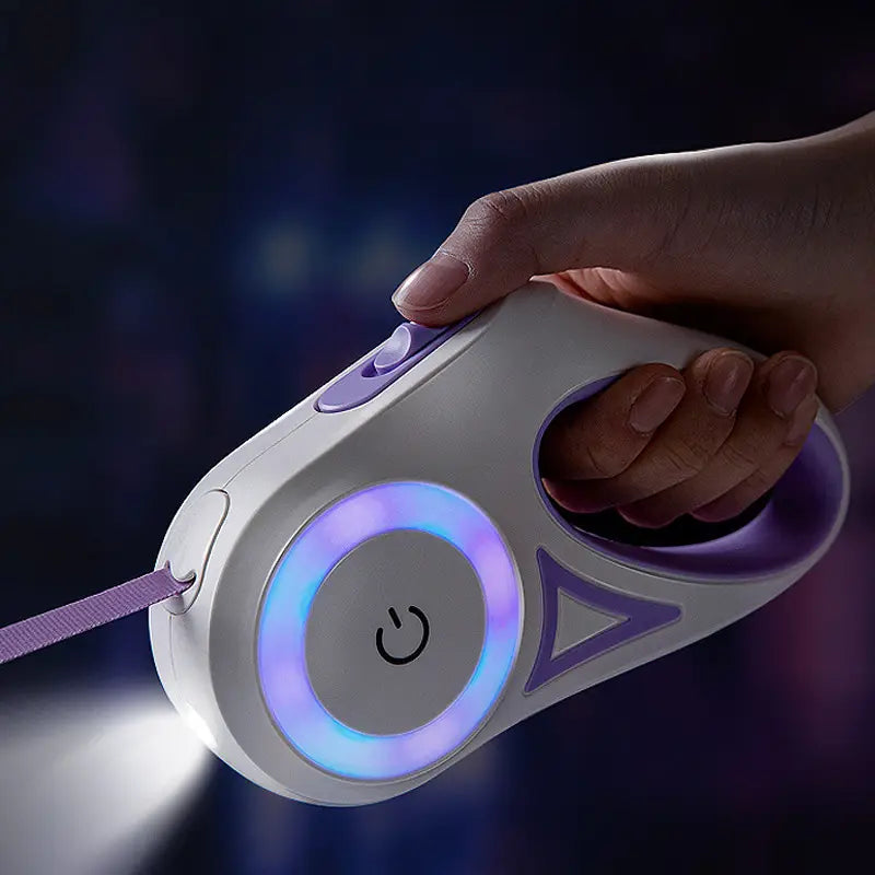 white and purple led dog leash retractable for small medium dogs with a traction rope and a circular power button illuminated by blue light.