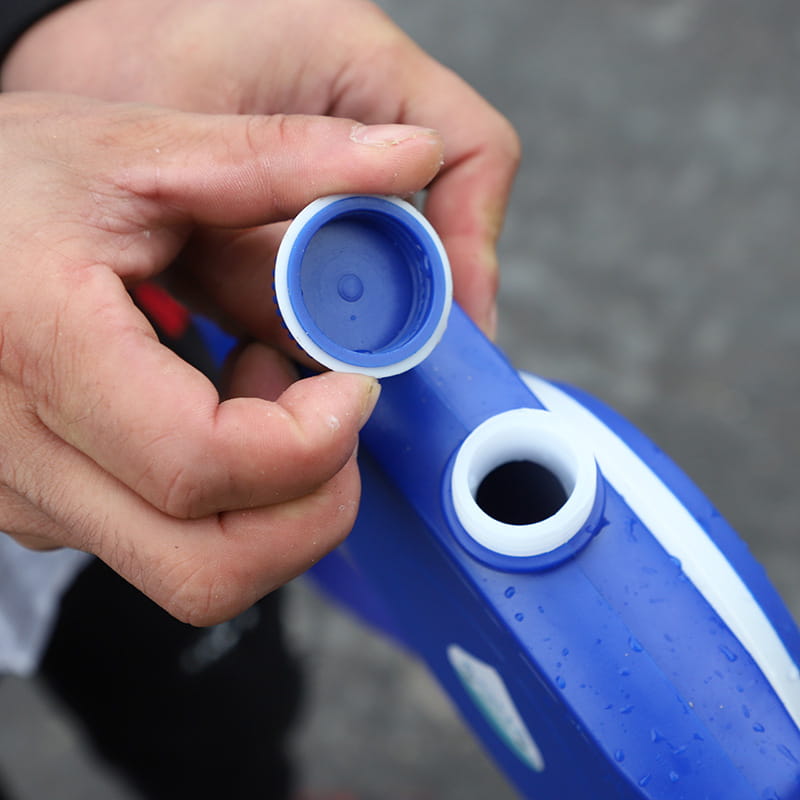 Blue collapsible pet water bottle made of plastic with a white rimmed cap and matching white stripe along its side featuring a pet rope for convenient use in pet supplies.