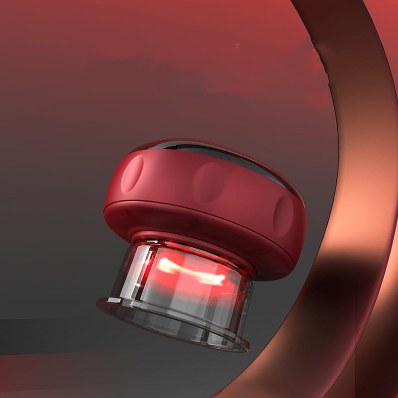 Red silicone electric vacuum cupping massager with a clear glass base and heating model emitting red light for negative pressure therapy.