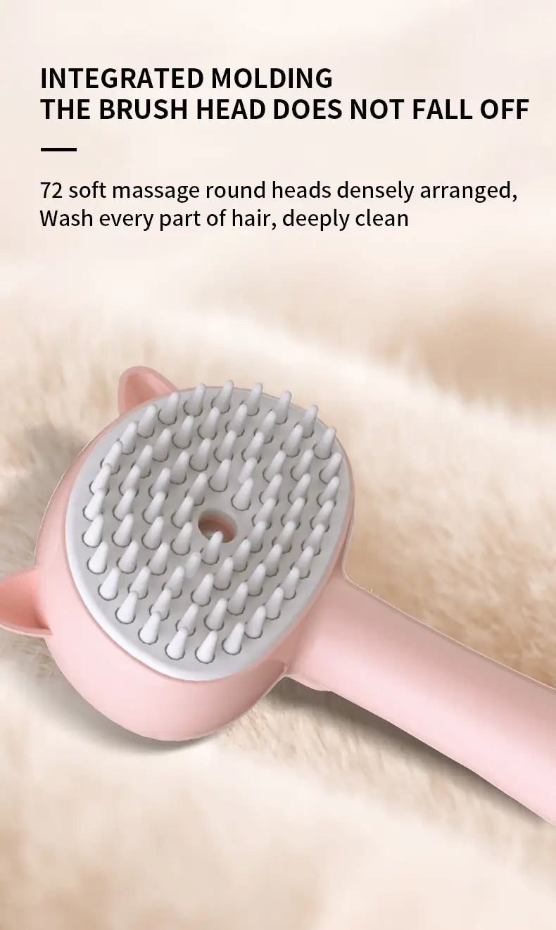 Pink cat-shaped self-cleaning mist grooming brush with a gray, densely packed head of 72 soft massage bristles designed for dog grooming brush use.