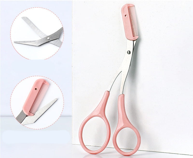 pink eyebrow trimming knife and scissors set featuring pink-handled eyebrow trimming scissors with a comb integrated into one stainless steel blade for precise eyebrow trimmer grooming.
