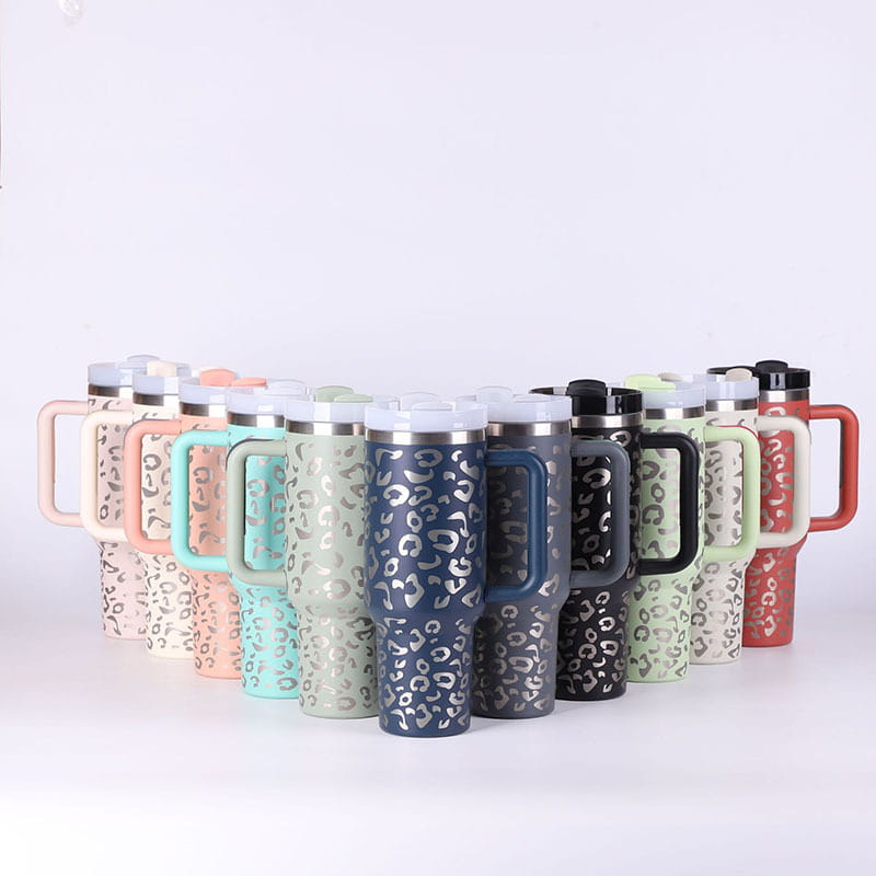 A collection of pastel and bold insulated travel mugs featuring a metallic leopard print design with stainless steel handle straw insulated construction and stainless steel spill resistance.