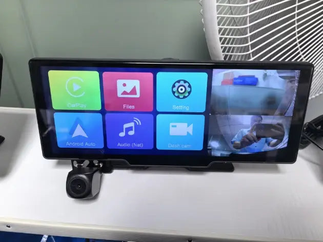 Black-framed 10.26 inch car navigation screen with rear dual recording split display showing colorful app icons and live camera feeds.