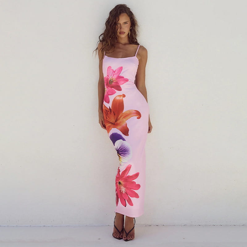a pink floral print american style flower strap dress with spaghetti straps and midi length suitable for casual wear