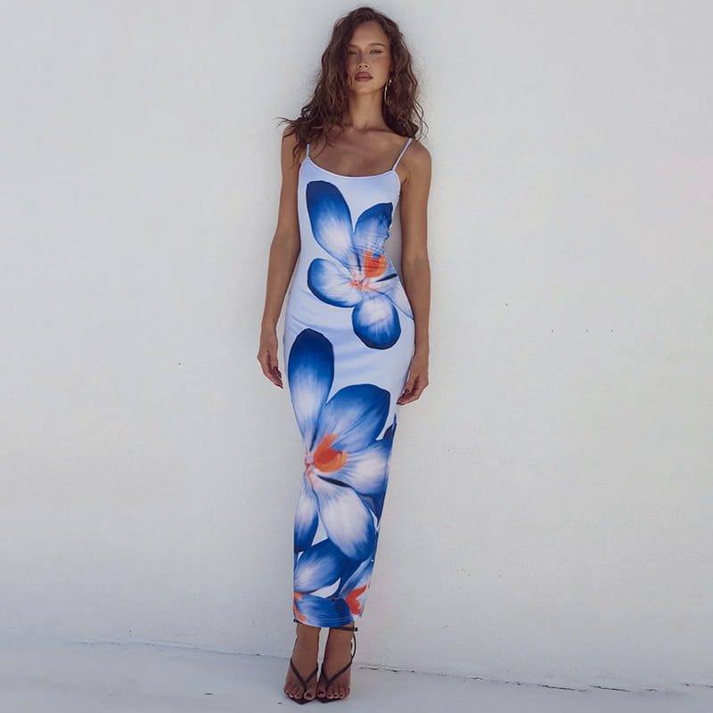 A white midi flower strap dress with large blue and orange floral prints in american style flower design.