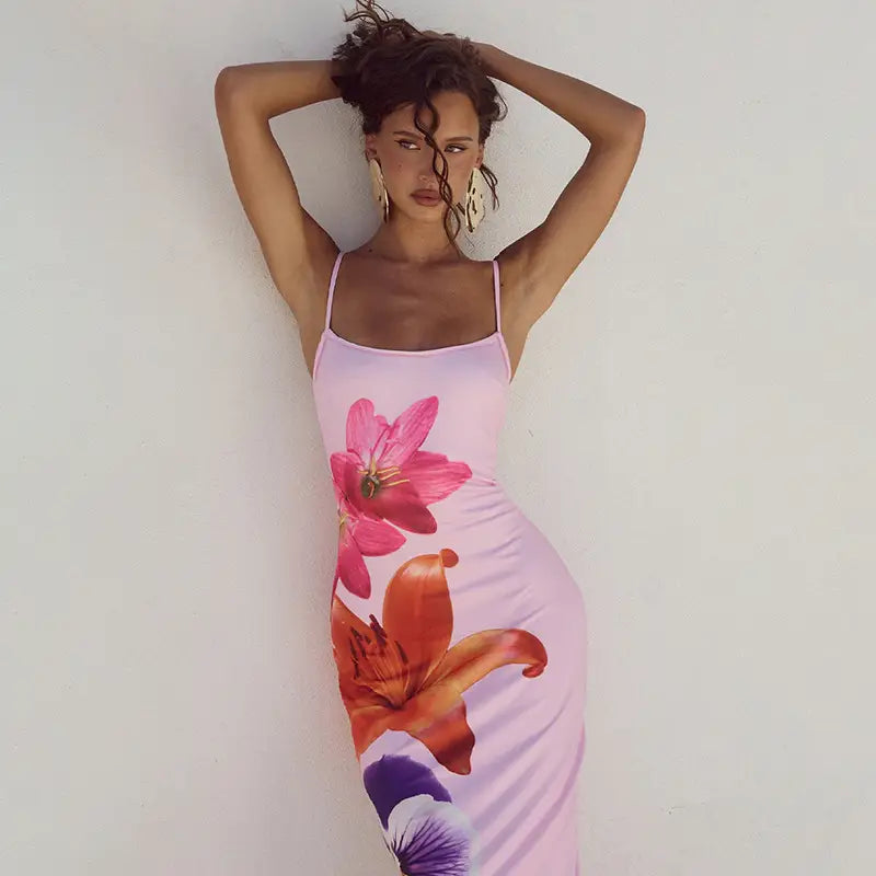 pink floral american style flower strap dress featuring a spaghetti strap design with vibrant orange and purple blossoms on a lightweight fabric