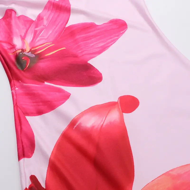 A vibrant pink floral american style flower strap dress top featuring bold red petals and a glossy finish.