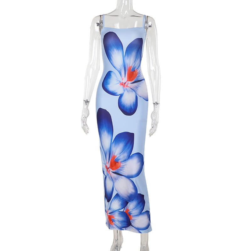 A light blue sleeveless maxi flower strap dress with a fitted silhouette featuring large bold american style flower prints in deep blue and vibrant orange centers.