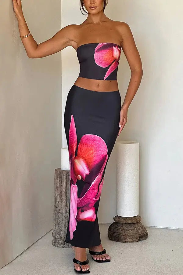 black strapless two-piece set with vibrant pink orchid print on crop top and high-waisted skirt ideal for fashion vacation women’s clothing skirts.