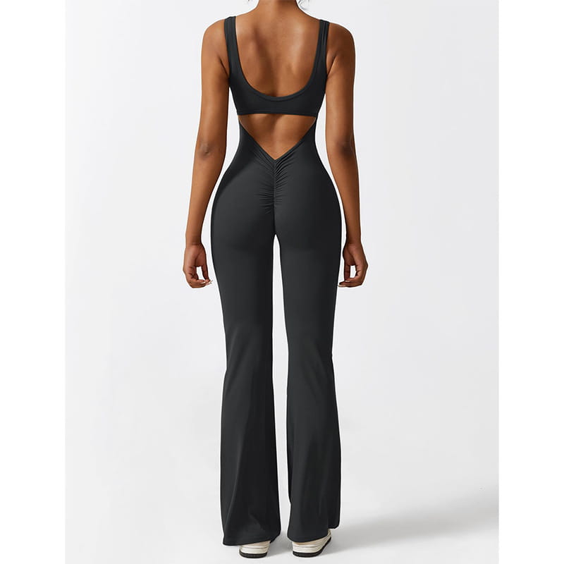 black sleeveless flare jumpsuit with a back cutout and ruched detailing designed for fitness and yoga activities in women sleeveless flare style