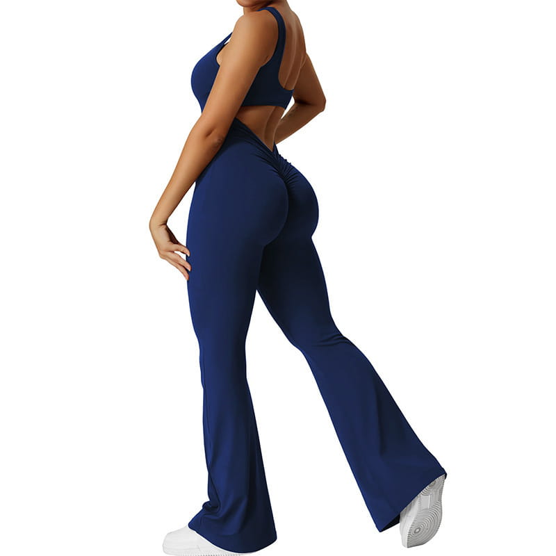 Navy blue high-waisted flared leggings with back seam detail shown from the back in a women sleeveless flare fitness yoga set.