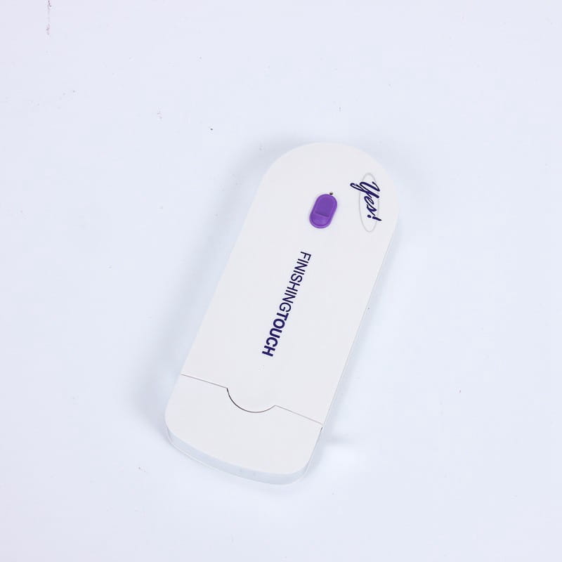 White plastic handheld electric hair removal device with sensa-light head purple power button and finishing touch branding.