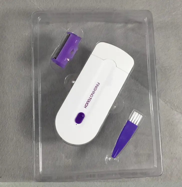 White and purple electric hair removal device with sensa-light head and interchangeable attachments for precise hair removal finishing touch.