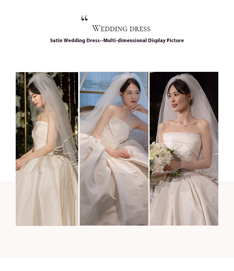 a simple elegant french style satin wedding dress featuring a strapless design with a flowing white satin fabric and an elegant voluminous skirt