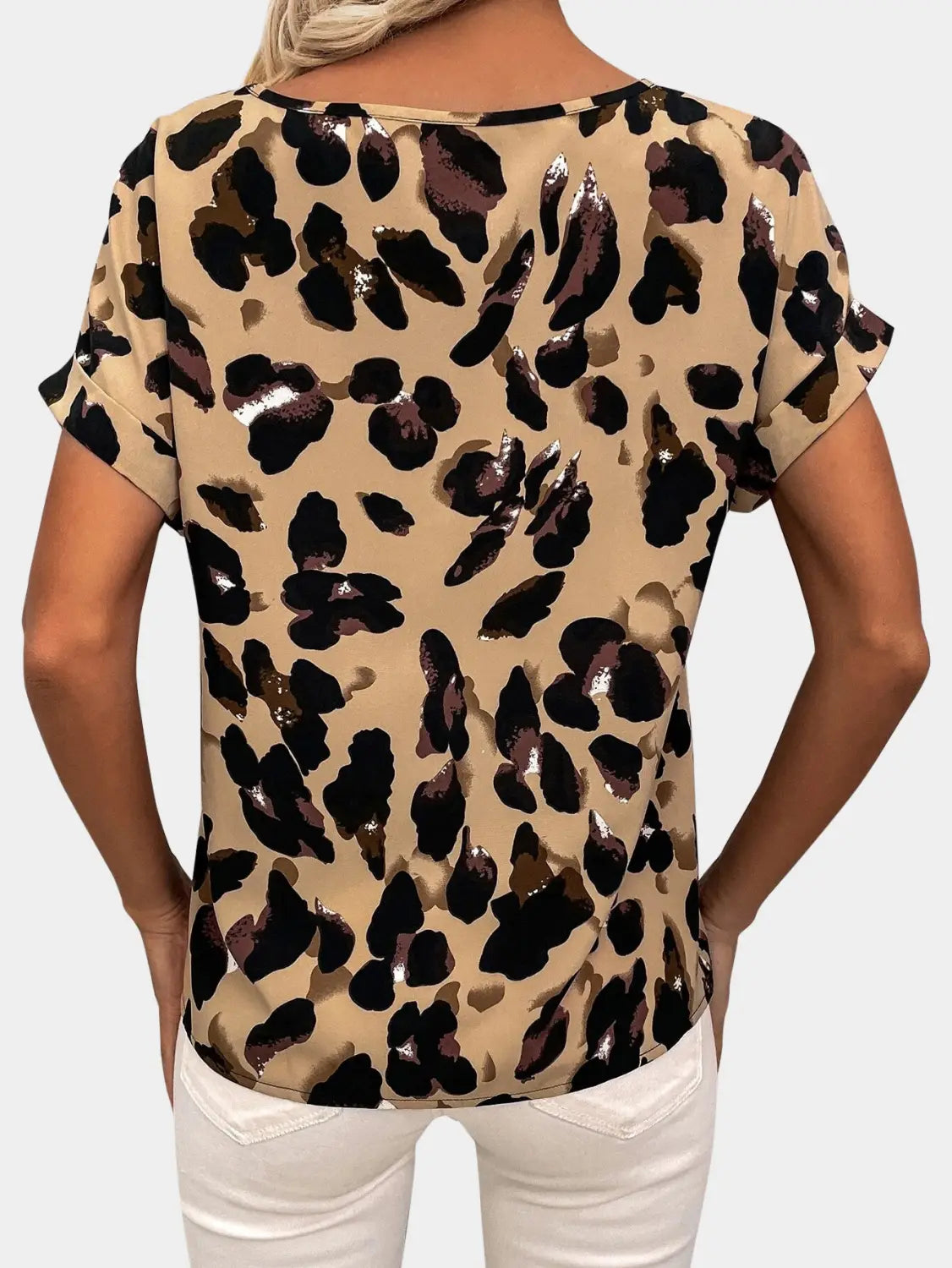 Beige leopard-print women’s clothing printed v-neck top featuring black and dark brown spots with a loose fit and short flutter sleeves.